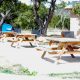 Our RV Park in the beautiful Texas Hill Country town of Pipe Creek, TX, just 45 minutes from San Antonio offers a spacious green area with picnic tables and BBQ grills.